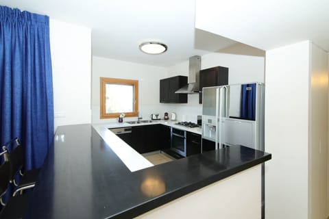 Apartment | Private kitchen | Full-size fridge, microwave, oven, stovetop