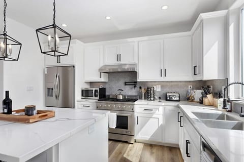 Entry Level | Kitchen- Collaboration of stainless, stone & hardwood
