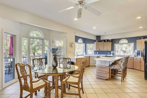 Fully stocked kitchen. Table seats 4-6, breakfast bar seats 3.