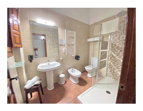 Family Loft, 1 Bedroom, Garden View, Poolside | Bathroom | Hair dryer, bidet, soap, shampoo