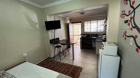 Standard Double Room | Private kitchen | Full-size fridge, microwave, stovetop, coffee/tea maker