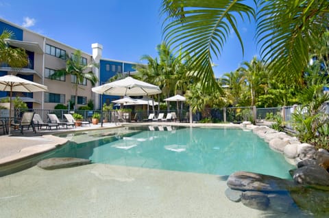 Outdoor pool, pool umbrellas, sun loungers