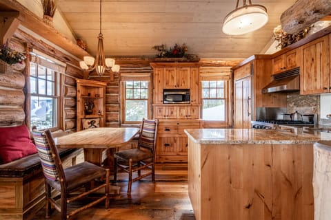 View of custom kitchen and dining for 6.