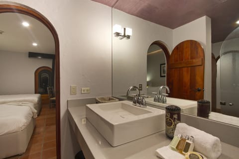 Grand Suite, Multiple Beds, Balcony, Garden View | Bathroom | Shower, rainfall showerhead, designer toiletries, hair dryer