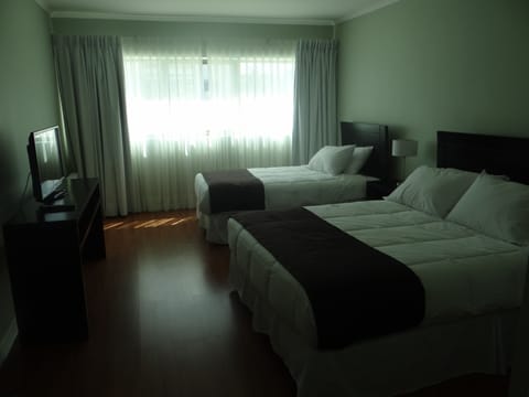 Family Triple Room | Bathroom | Shower, free toiletries, hair dryer, towels