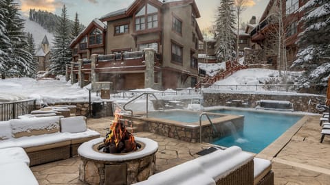 Guest Access to heated pool and outdoor fire pit at Osprey Hotel
