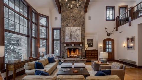 Great Room with grand fireplace vaulted ceiling