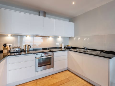 Modern fitted kitchen and dining area | Apartment 50, Westward Ho!