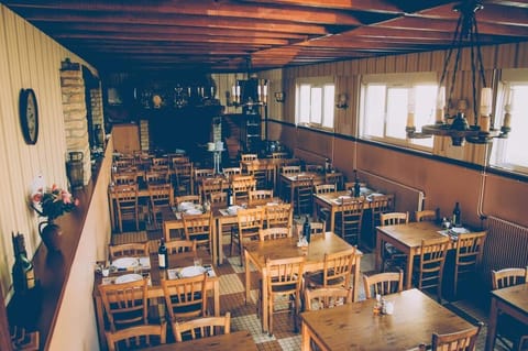 Breakfast, lunch, dinner served; local cuisine 