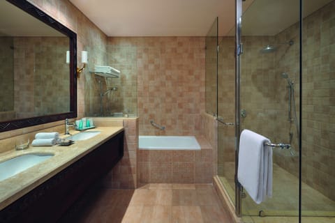 Deluxe Suite, 1 King Bed, Pool View | Bathroom | Rainfall showerhead, eco-friendly toiletries, hair dryer, bathrobes