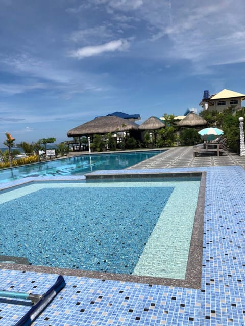 Outdoor pool, open 7:00 AM to 7:00 PM, sun loungers