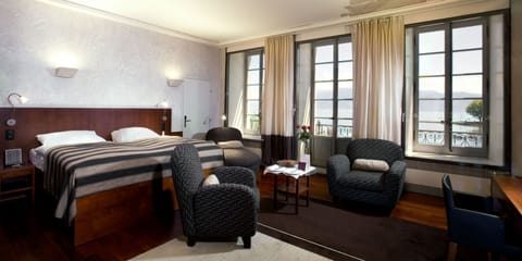 Junior Suite, Lake View | Hypo-allergenic bedding, minibar, in-room safe, individually decorated