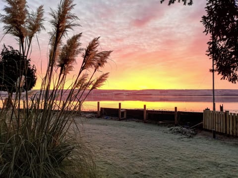 Large lawned enclosed garden with garden furniture | St Brighs, Dingwall