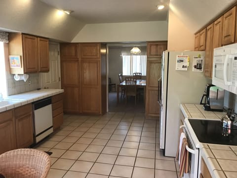 A view from the kitchen through to the dining room