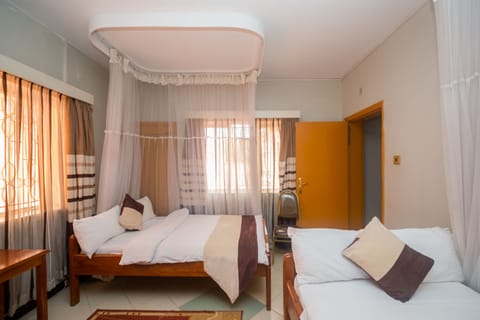 Executive Twin Room | 4 bedrooms, desk, free WiFi