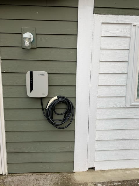 Electric Car charger 🔌 in driveway.  Please inform me first if needed with stay