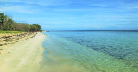 On the beach, white sand, 3 beach bars