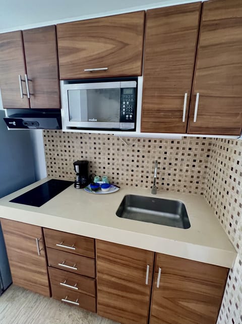 Panoramic Studio Suite, Balcony, Beach View | Private kitchen | Microwave, electric kettle, cookware/dishes/utensils