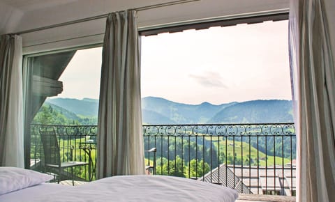 Junior Suite, Balcony, Mountain View | Hypo-allergenic bedding, in-room safe, desk, iron/ironing board