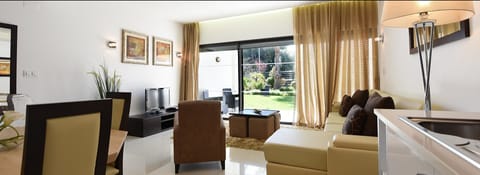 Townhome, 2 Bedrooms (2 Bathrooms / Main Building) | Living area | 43-inch LCD TV with satellite channels, TV