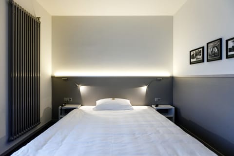 Minibar, desk, blackout drapes, iron/ironing board