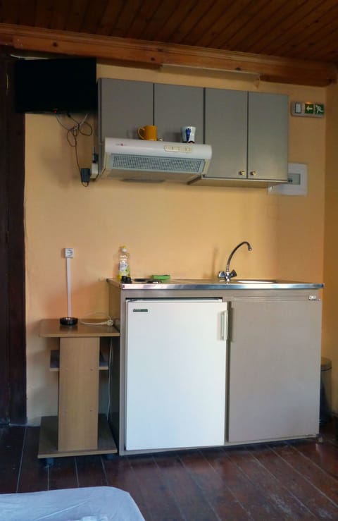 Quadruple Room | Private kitchenette | Fridge, electric kettle