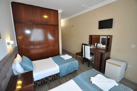 Basic Double or Twin Room, 1 Double Bed, City View | Bathroom | Shower, hair dryer, slippers, towels