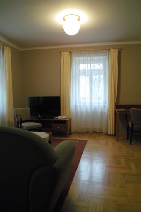 Apartment, 2 Bedrooms (3 people) | Living area | Flat-screen TV