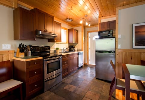 2 Bedroom Cottage F | Private kitchen | Full-size fridge, microwave, stovetop, dishwasher