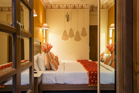 Royal Room | Select Comfort beds, in-room safe, individually decorated