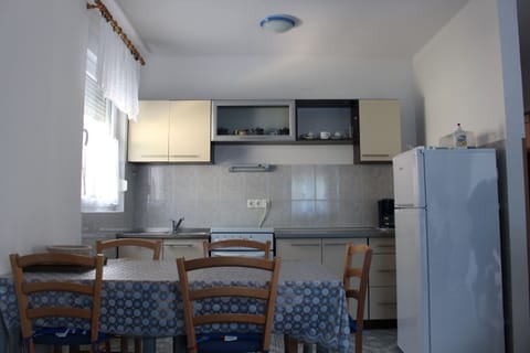 Apartment, 2 Bedrooms, Sea View (1) | Private kitchen | Fridge, stovetop, coffee/tea maker, electric kettle