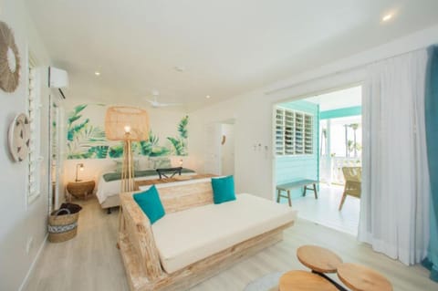 Bungalow, Lagoon View | Premium bedding, minibar, in-room safe, individually decorated