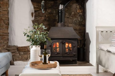 Roseneath, St Agnes. Ground floor: Snug with cosy wood burning stove