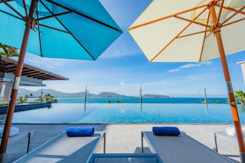 2 outdoor pools, pool umbrellas, sun loungers