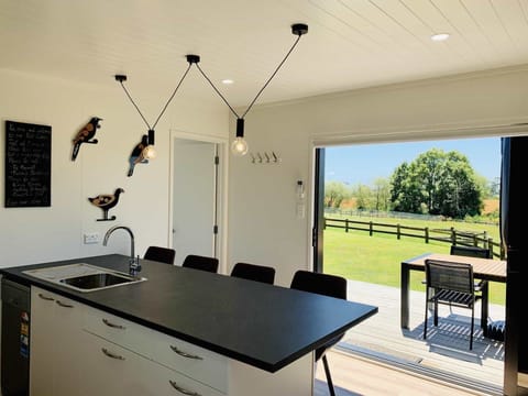 Kiwi Cabin dining area and view