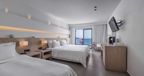 Standard Triple Room, Sea View | In-room safe, desk, blackout drapes, soundproofing