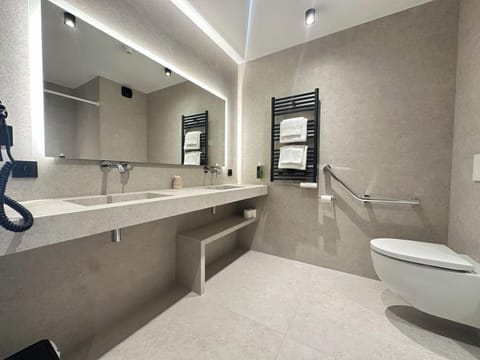 Shower, rainfall showerhead, towels, soap