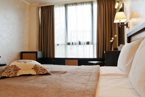 Double Room | Premium bedding, minibar, in-room safe, individually decorated