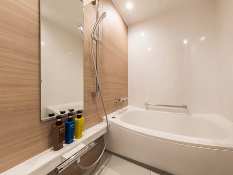 Separate tub and shower, slippers, electronic bidet, towels