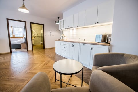 Apartment, 1 Bedroom (Ludwik) | Living area | Flat-screen TV