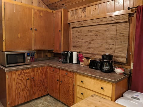 Kitchen includes Microwave Oven, knives, toaster, 2 different coffee pots.