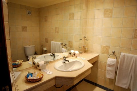 Shower, eco-friendly toiletries, hair dryer, towels