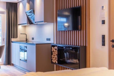 Superior Studio | Private kitchen | Full-size fridge, microwave, stovetop, dishwasher