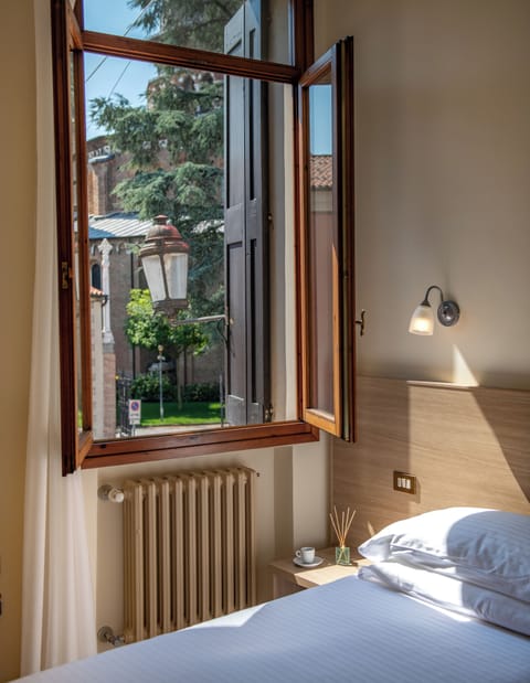 Standard Double Room (Basilica View) | In-room safe, desk, iron/ironing board, free WiFi