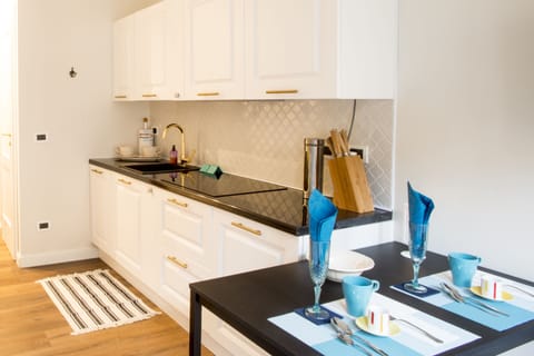 Apartment, 1 Bedroom | Private kitchen | Fridge, microwave, stovetop, dishwasher