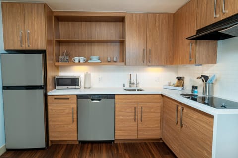 Suite, 1 King Bed | Private kitchen | Fridge, microwave, coffee/tea maker