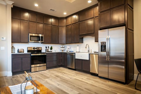 Suite, 2 Bedrooms | Private kitchen | Fridge, microwave, dishwasher, coffee/tea maker