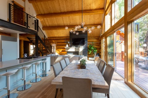 Seating for 10 + 4 at the breakfast bar (8 chairs shown in picture)