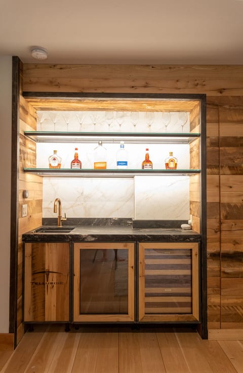 Wet bar - storage for drinks and wine.