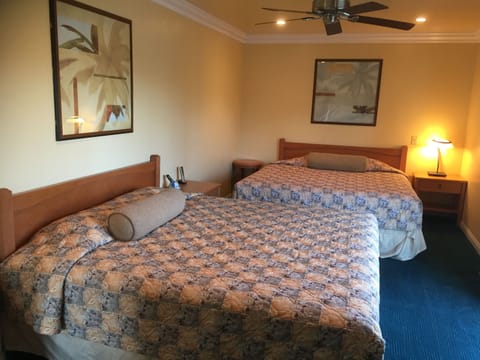 Executive Suite, Multiple Beds | Living area | TV